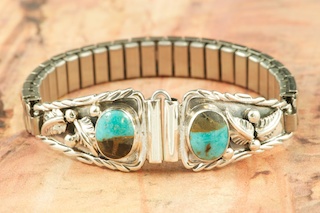 Genuine Sunnyside Turquoise set in Sterling Silver. Ladies Watch Tips with expandable band. Created by Navajo Artist Larson Lee. 